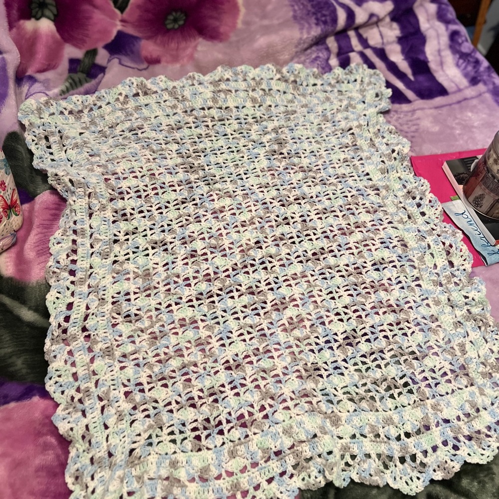 Crocheted baby blanket.